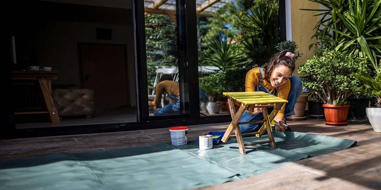 Woman making home improvements